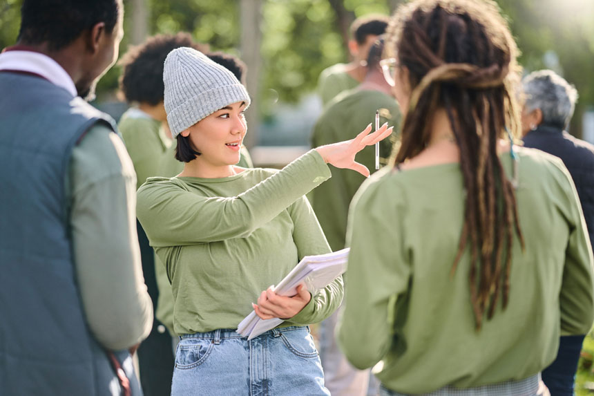 Helping professionals gathered in conversation outdoors